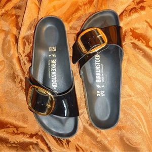 Birkenstocks - black with gold buckle